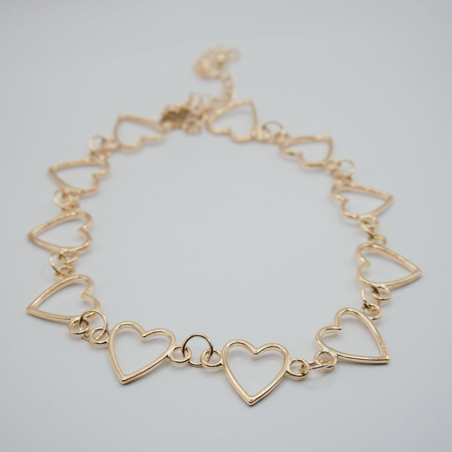 Y2K style gold heart choker necklace